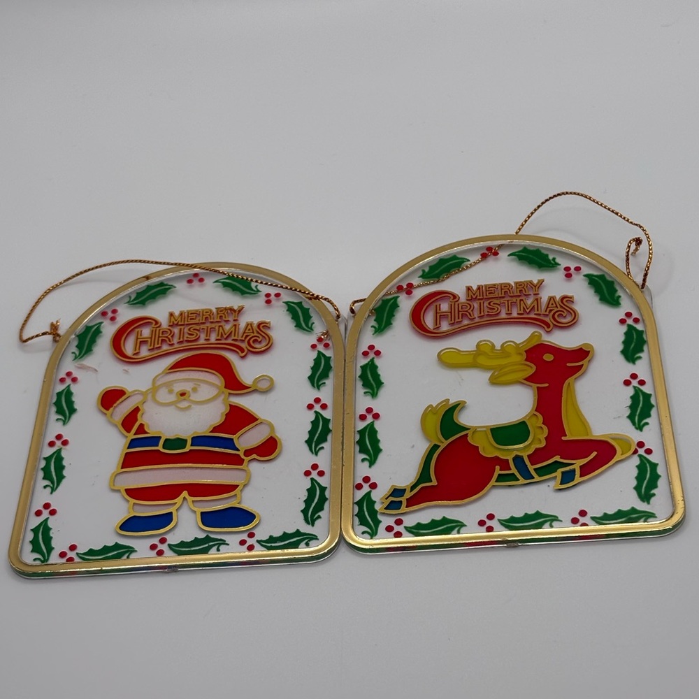 Two Merry Christmas Suncatcher Ornaments Deer & Santa Plastic Arch Shaped 3.5X4”